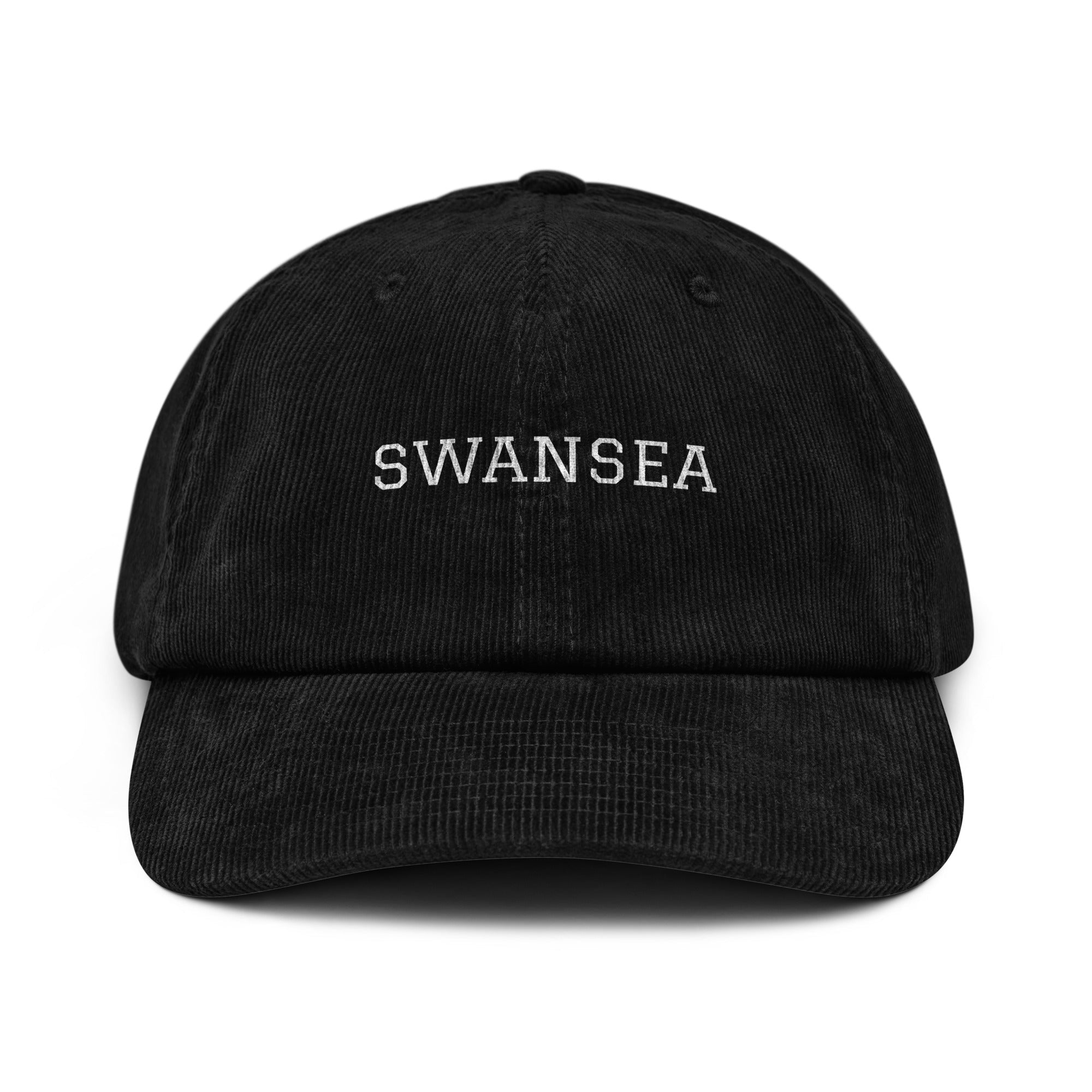 Picture of a oxford navy corduroy cap with the word Swansea on the front.